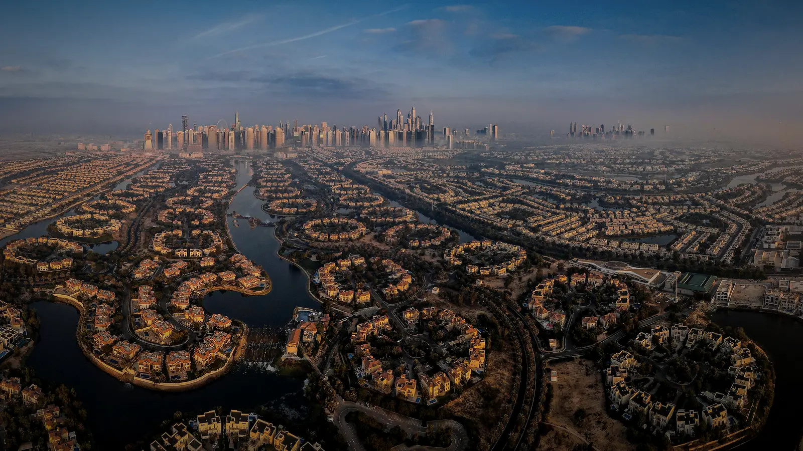 Aerial view of Jumeirah Islands villas at sunset